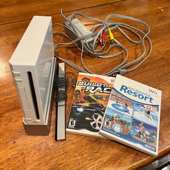 Wii console with two games. Remote is NOT included.